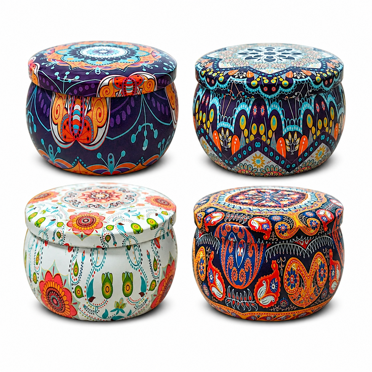 Four decorative soy wax candle tins on a white background